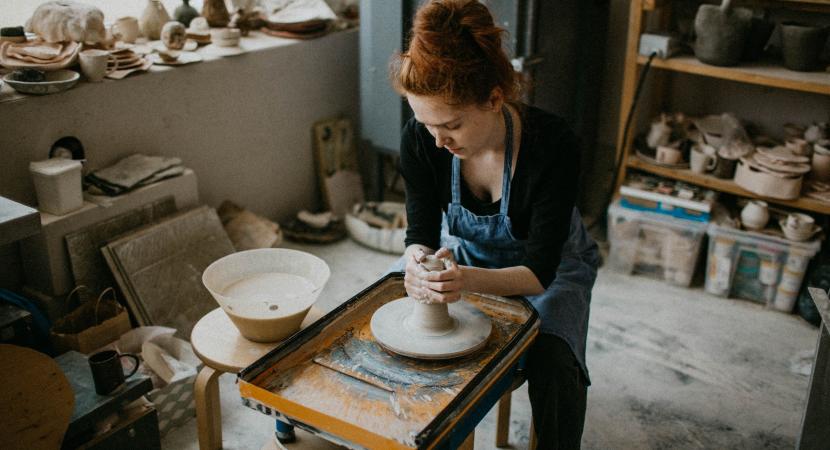 A woman making pottery