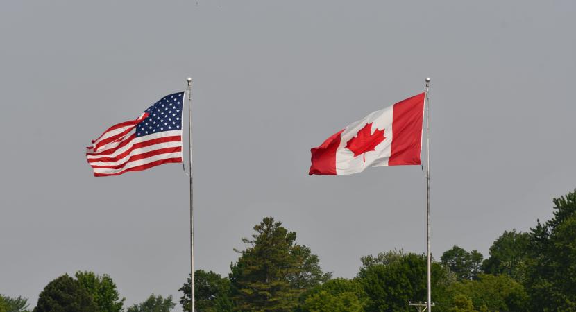 Photograph of the United States' and Canada's flags